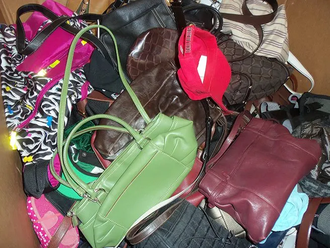 Assorted used purses and handbags